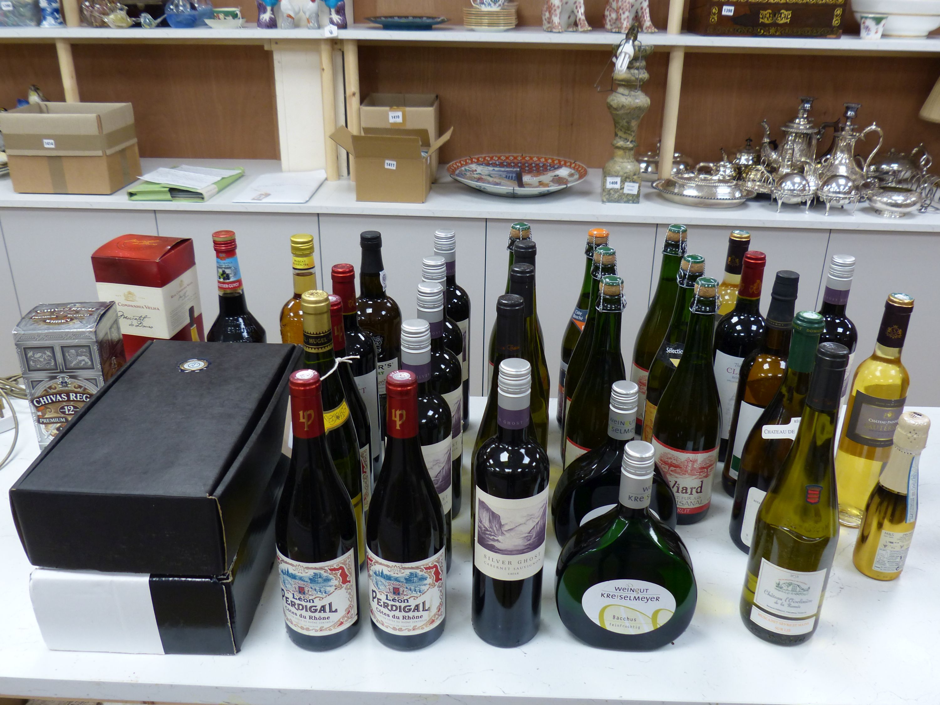 A large quantity of mixed wines, spirits and liqueurs including a 12 year Chivas Regal